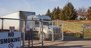 Semi going through yard gate