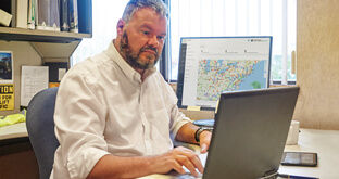 Fleet manager doing DOT recordkeeping