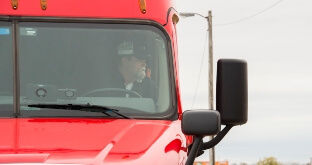 Driver in red semi truck