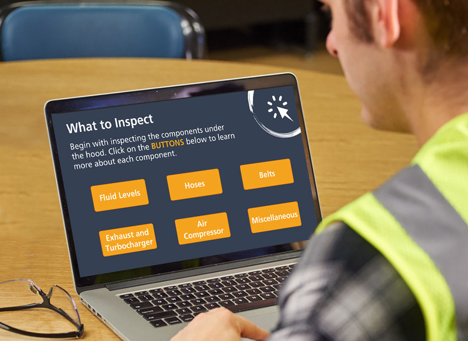Driver taking training course on laptop