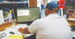 Fleet manager tracking vehicles on map