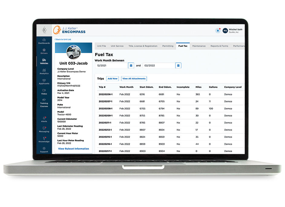 Laptop with Encompass Fuel Tax on screen