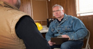 Truck driver being interviewed