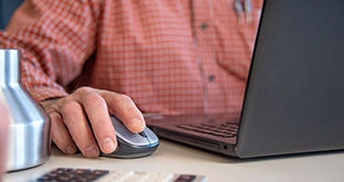 Fleet manager using laptop