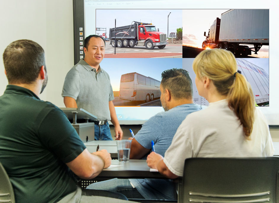 Driver training situation with instructor at front of room