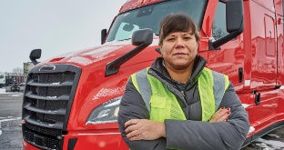 Female truck driver with semi truck