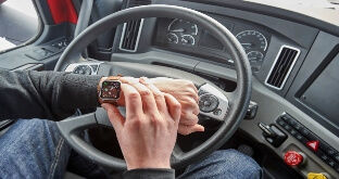 Truck driver checking drive time