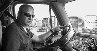 Driver looking through truck window