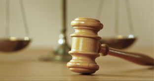 Gavel on a courtroom table