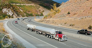 Tanker driving on scenic road