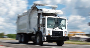 Dump truck driving on road
