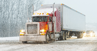 Semi truck on snowy road