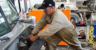 Mechanic working on a vehicle