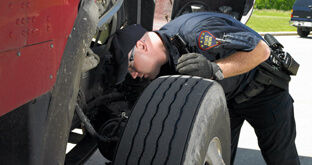 Officer doing a roadside inspection