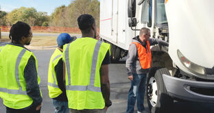 Truck drivers receiving training