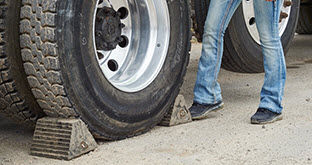 Close up of truck tire on blocks